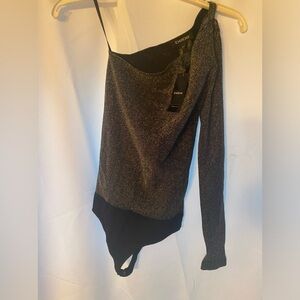 Asymmetrical Bebe silver/black body suit